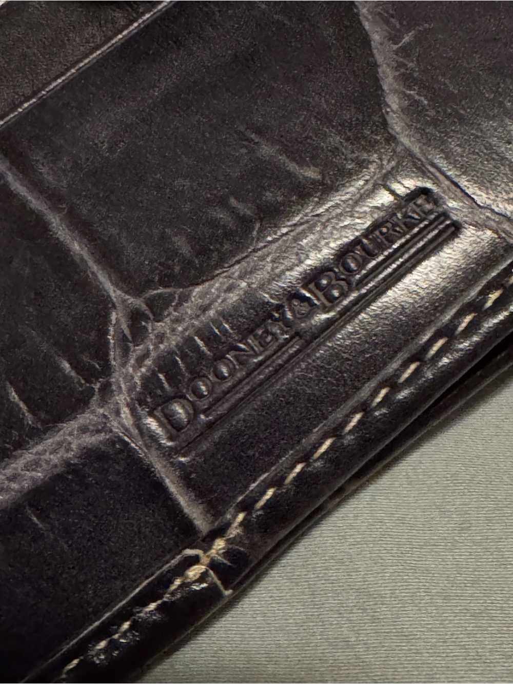 A Dooney & Bourke Croc-Embossed Compact Wallet with Gold Plaque - Picture 5 of 5